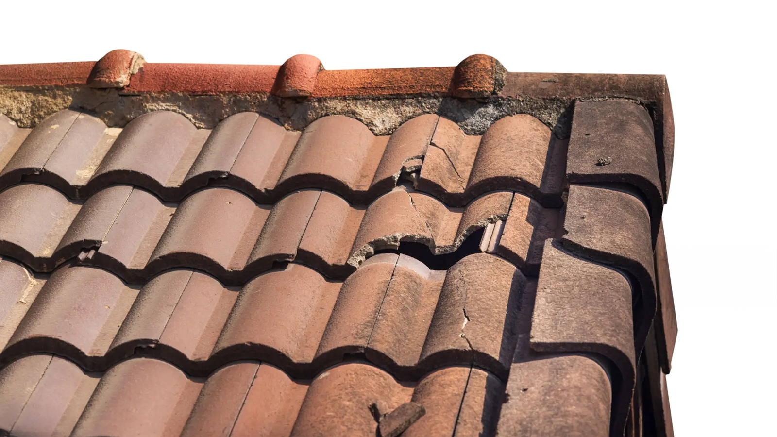 Broken tile roof causing water intrusion and potential leak in Arizona home
