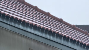 Damaged tile roof underlayment causing roof leak in Arizona home
