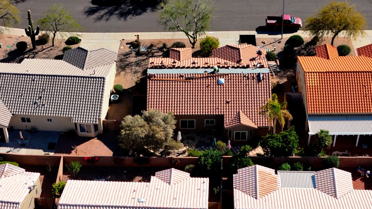 Tile roof replacement project aerial view in Sun City Arizona residential neighborhood